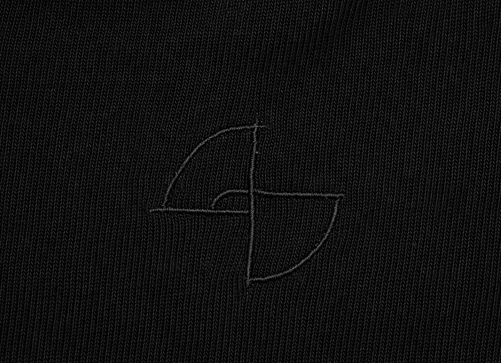 Subtle upper-back embroidery on black 215 gsm organic cotton T-shirt, ARC Exhibit 01 Vector
